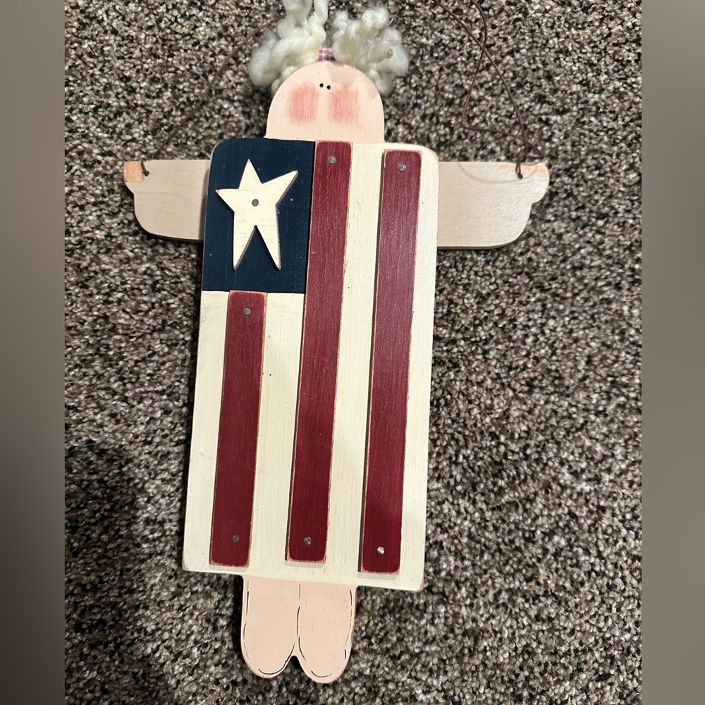 Country crafted American Flag angel person .